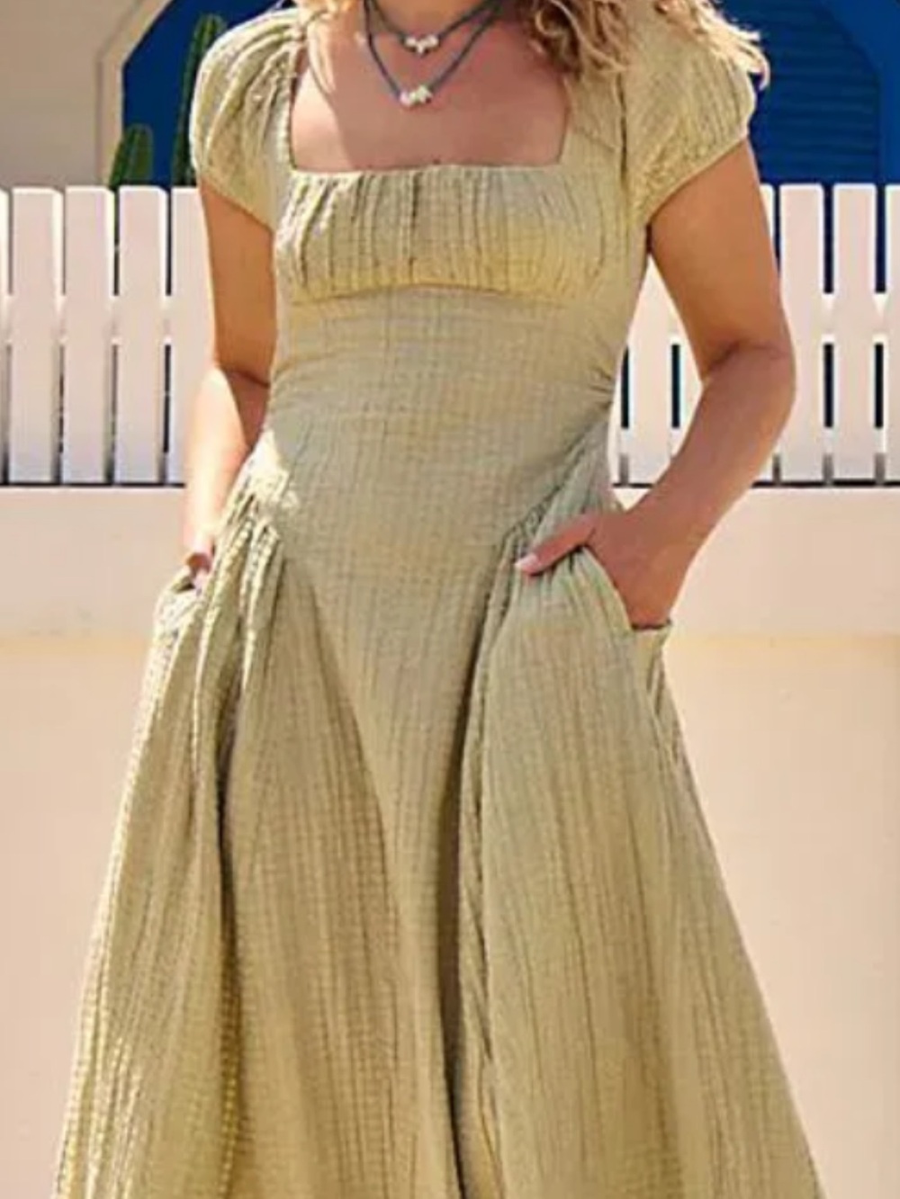 This Free People "Ciara Pucker Check Midi" dress a textured cotton fabric